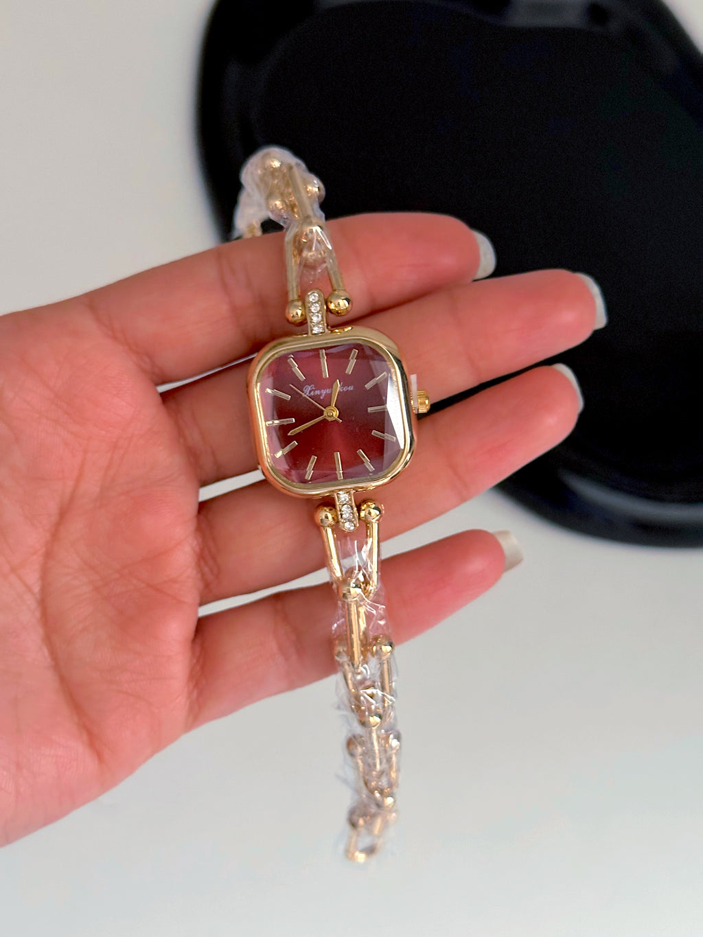 burgundy watch